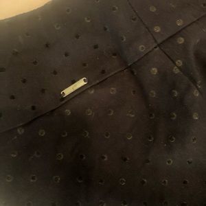 Athleisurewear/golf slack  Black dot with scalloped ankle slit. New. Never worn